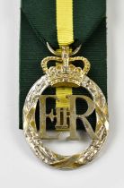 A Queen Elizabeth II Territorial Efficiency Decoration, unnamed as issued but inscribed '1960' on