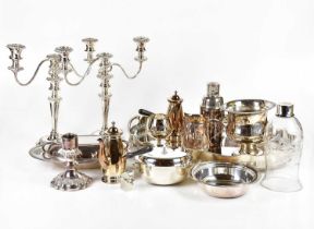 A collection of assorted silver plate including gallery tray, candelabra, cocktail shaker etc.