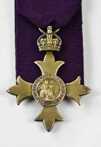 An Order of the British Empire Medal with the 1st type civil ribbon, hallmark dated 1918, silver