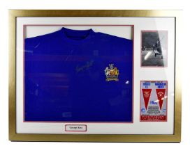 GEORGE BEST; a signed retro style Manchester United football shirt, framed and glazed.