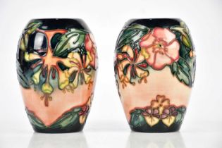 RACHEL BISHOP FOR MOORCROFT; a pair of ovoid vases in the 'Oberon' pattern, height 13cm (2).