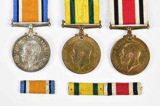 A trio of George V medals including War Medal named to 1660 Corporal L.P Jones Middlesex Regiment,