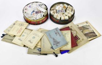 An extensive collection of cigarette cards and stamps including John Player & Sons, etc.
