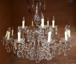 A large and impressive cut glass electrolier with ten lower scrolling branches with substantial