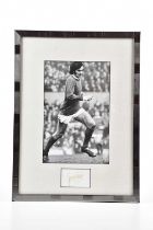 GEORGE BEST; a black and white image of George playing football, with a signature card, overall 43.5