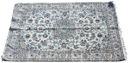 A cream ground floral decorated rug with simple border, 206 x 130cm.