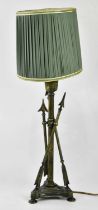 A modern brass desk lamp with rotating green glass shade and a modern table lamp modelled as three