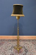 A late 19th century brass telescope standard lamp, height including shade 199cm.