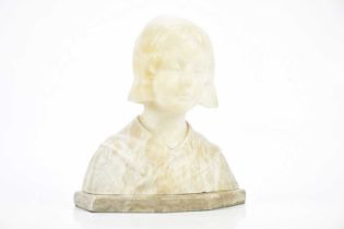 An Art Nouveau style alabaster bust of a Dutch girl on oval plinth base, height 28cm.