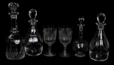 Three cut glass decanters, height of largest 27cm, together with further etched glass decanter and