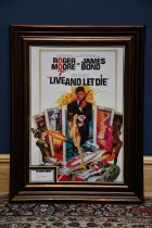 ROGER MOORE; a framed reproduction poster, 'James Bond: Live and Let Die', 70 x 47cm, framed and