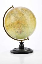 E L ARNOLD & SONS; a 12" globe on ebonised stand, height 45cm.