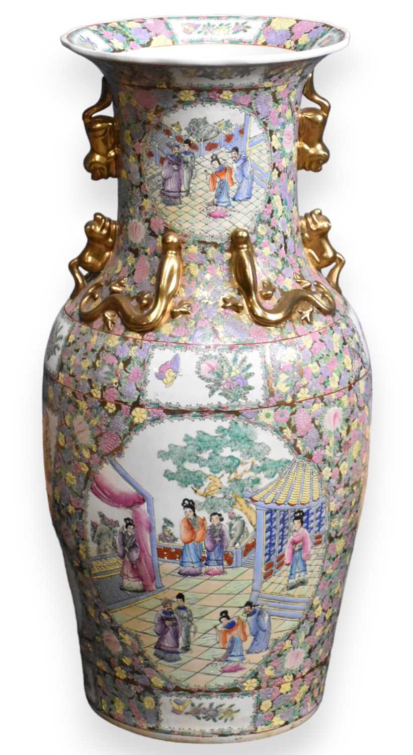 A large reproduction Chinese Famille Verte floor vase, with moulded shishi dogs and serpents,