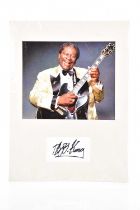 B B KING; a montage bearing a photograph of B B King with Gibson electric guitar above an