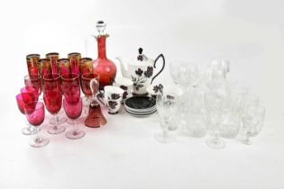 A collection of assorted glassware including Bohemian style cranberry glass drinking set, various