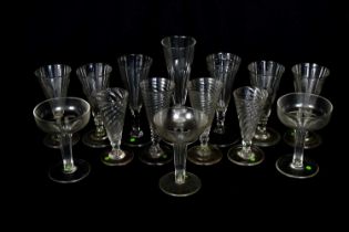 A collection of 19th century and later glassware including ale glasses, champagne flutes, etc.