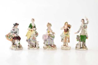 SITZENDORF; five 20th century porcelain figures including a pair representing a seated male and
