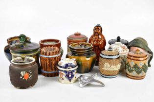 A collection of tobacco jars to include two Doulton Lambeth examples, largest 20cm.