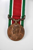 An Edward VII Tibet Medal in bronze 1903-04, named to 1308 Cooly Mir Ali, Supply and Transport