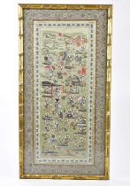 A 20th century Chinese silk panel, decorated with figures and prunus flowers, 64 x 32cm, framed