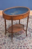 An Edwardian Sheraton Revival inlaid mahogany oval bijouterie table, with undertier, on tapered