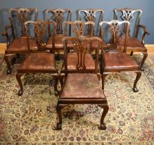 A set of eight Edwardian mahogany dining chairs, attributed to Waring and Gillow, including two with