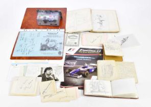 A collection of various autographs including a signed Bobby Charlton Family Fun Day programme,