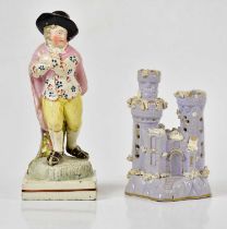 A 19th century Staffordshire figure plus a castle pastille burner, height of figure 19cm.