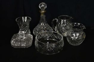 A small group of cut glass including a ship's decanter with hallmarked silver collar, water jugs,