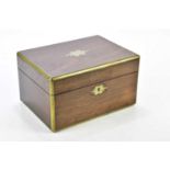 A Victorian brass bound rosewood vanity case, the hinged cover enclosing push release button and