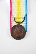 A Victorian Kabul to Kandahar Medal 1842, marked 'Specimen' and unnamed.