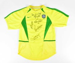 BRAZIL; a 2002 Nike football shirt, signed to the front by Pelé, Rivaldo, Ronaldo, Ronaldinho and