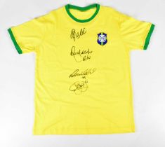 BRAZIL; a 1970s retro style football shirt, signed to the front by Pelé, Ronaldinho, Ronaldo and