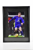 WAYNE ROONEY; an autographed image of Wayne in a Manchester United jersey with hologram Hall of Fame