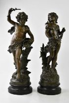 A pair of 19th century bronzed spelter figures of children, height 57cm (2).