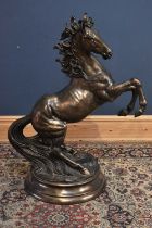 A large and impressive modern bronze effect rearing horse, height 112cm.