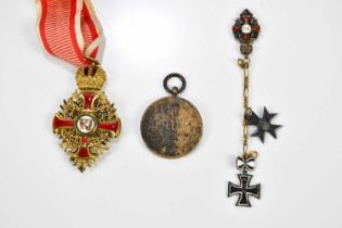 An Austrian order of Franz Joseph by V. Mayer, with enamel decoration, red and white ribbon, a
