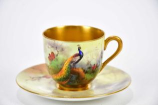 R AUSTIN FOR ROYAL WORCESTER; a hand painted coffee can and saucer decorated with pheasants in