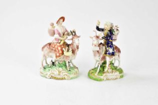 A pair of late 18th century Derby models of The 'Welsh' Tailor and his Wife, each astride goats with