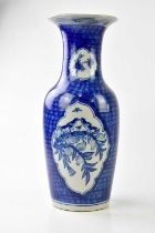 A Chinese blue and white vase decorated with birds and fruit, height 48cm. Condition Report: Glaze