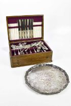 An oak cased canteen of silver plated cutlery and a Victorian silver plated salver (2).