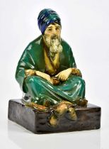 CHARLES NOKE FOR ROYAL DOULTON; a figure HN542 'The Cobbler', impressed signature, height 18cm.