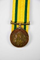 A Territorial Force War Medal and associated paperwork, named to 1447 Corporal F. R. Murphy Royal