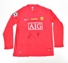 MANCHESTER UNITED; a 2008 retro style football shirt, signed to the front by Rooney, Giggs and