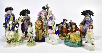 STAFFORDSHIRE; a collection of 19th century and later figures to include 'Nelson' jug, 'Widow', 'Red