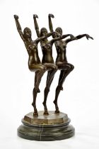 A decorative reproduction bronze figure of three Art Deco style dancing girls on marble plinth base,