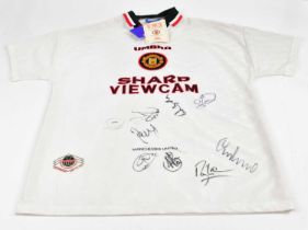 MANCHESTER UNITED; an Umbro football shirt bearing numerous signatures, including Roy Keane, Rio
