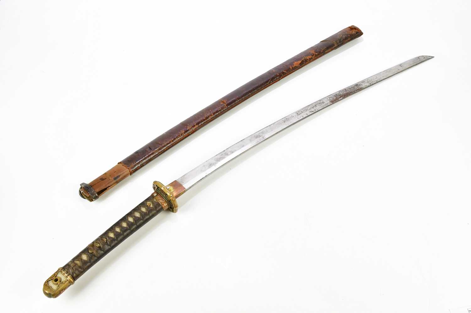 A Japanese WWII army officer's Katana type 98 sword, with shagreen grip and gilt metal terminal, and