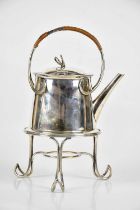 An Arts and Crafts spirit kettle on stand with wicker handle, stamped 'Long Cardiff' and numbered