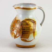 † ALAN CAIGER-SMITH (1930-2020) for Aldermaston Pottery; a tin glazed earthenware jug decorated with